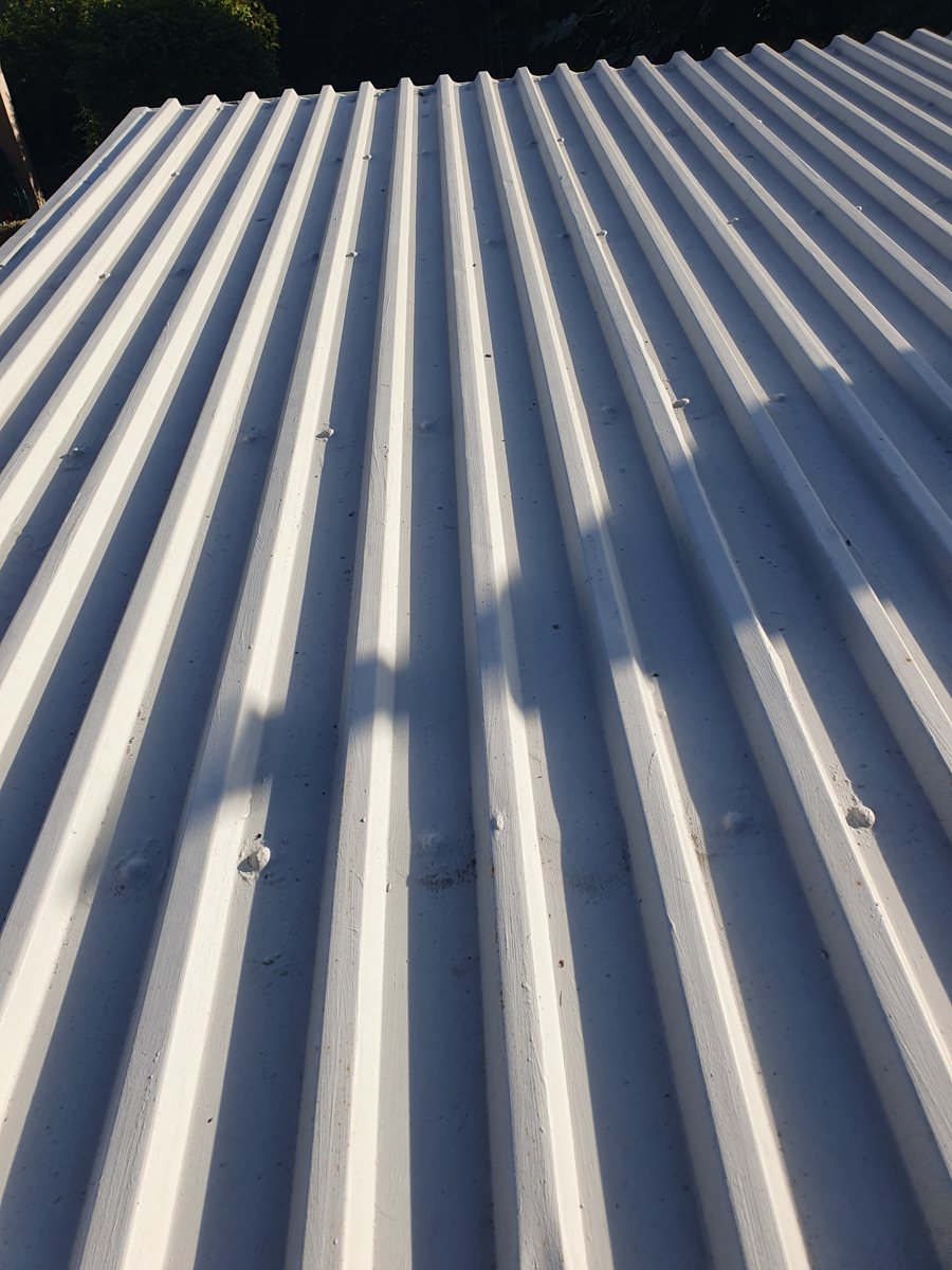 Corrugated roof repair before repair